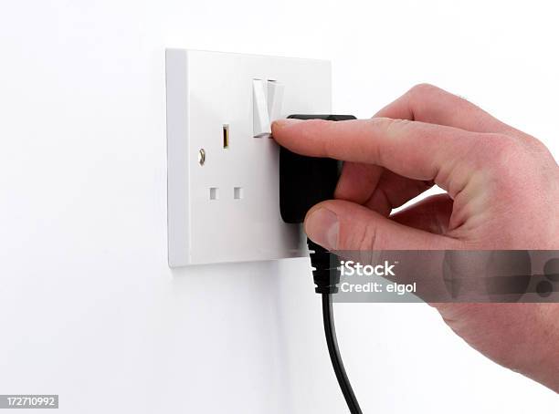 Foto de Mude Para Força Com A British Tomada Plug Da Electricidade E e mais fotos de stock de Tomada