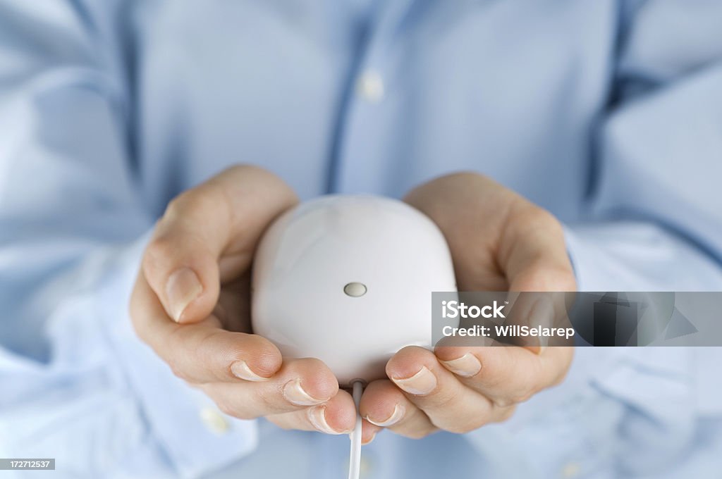 Hands and mouse Hands and mouse on a horizontal composition Computer Store Stock Photo