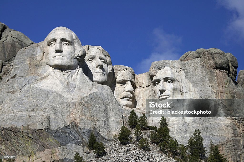 Mount Rushmore Close up view of Mount Rushmore under a blue sky Mt Rushmore National Monument Stock Photo