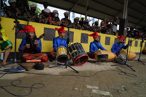 Toraja Utara, Indonesia - August 25, 2022: Four men are playing \