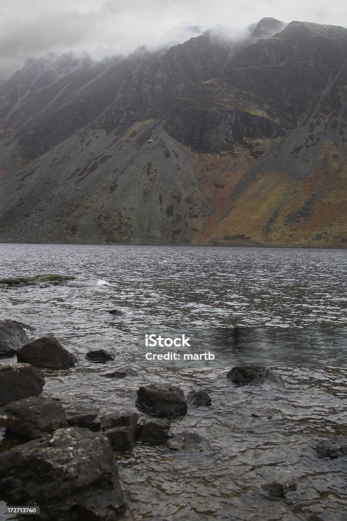 Mountains with drifting cloud Boulder - Rock Stock Photo