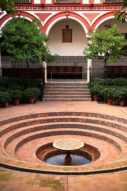 Central patio of  Hospital de los Venerables. This hospital dates from the same period as the Hospital de la Caridad, and building work on it was finished by Leonardo de Figueroa in 1687. It is frequently used nowadays to put on art exhibitions, especially painting exhibitions.