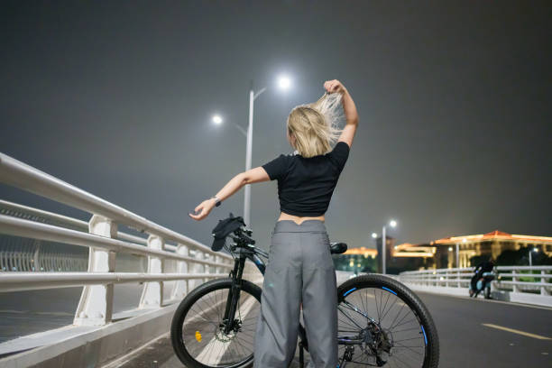 Girl riding outdoors at night