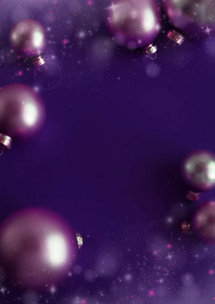 Christmas background template  top view with copy space. Violet colors balls frame on violet backdrop.Beautiful Xmas greeting card.New Year decor balls frame mockup .
