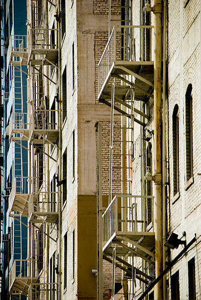 istock Fire escapes in an alley 172714735