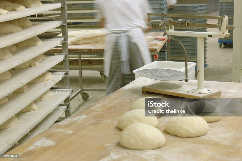 Preparing bread Preparing bread in a bakery Industry Stock Photo