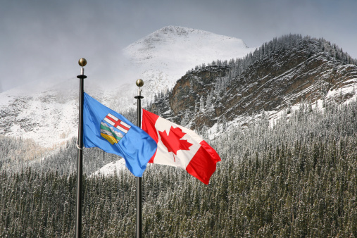 Canada and Alberta flags at Lake Louise
