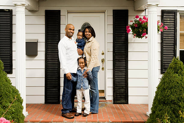 istock Young Family on Front Porch 172715045