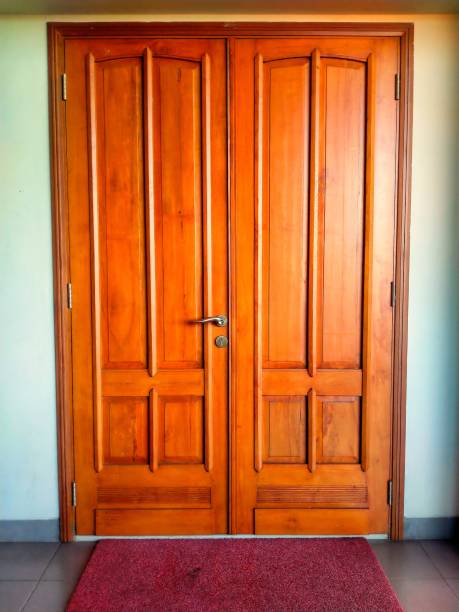 istock Two varnished wooden doors show off their natural texture 1727153882