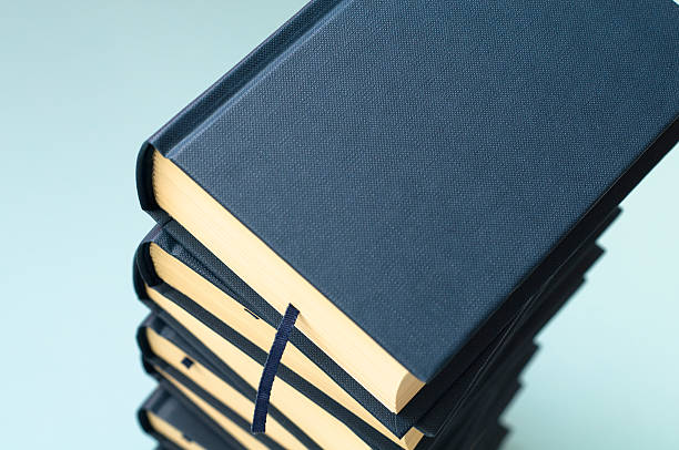 istock Pile of heavy books with copyspace 172715518