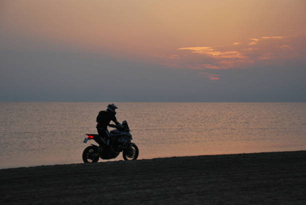 Rimini, Italy, October 8, 2023,boy doing motocross on the beach