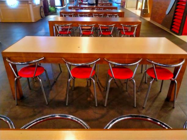 istock Dining table and chairs that can be used by several people 1727165551