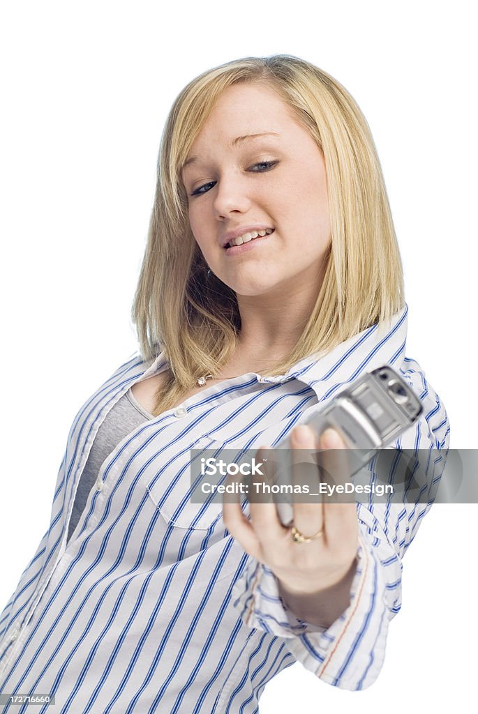 Adolescente posant tout en prenant selfie sur fond blanc. - Photo de Adolescence libre de droits