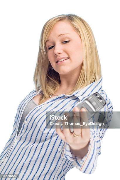 Photo libre de droit de Adolescente Posant Tout En Prenant Selfie Sur Fond Blanc banque d'images et plus d'images libres de droit de Adolescence