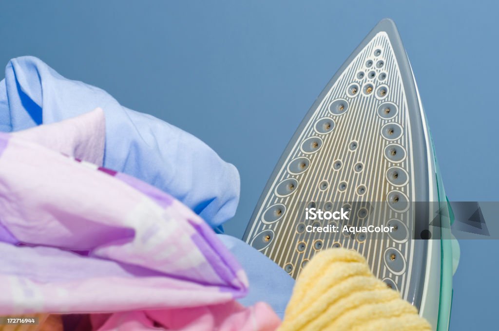 Clothes & Iron Clothes for ironing. Clothing Stock Photo