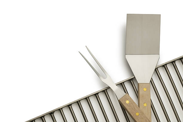 Barbecue utensils on a grill.For more of my Barbecue images click below: