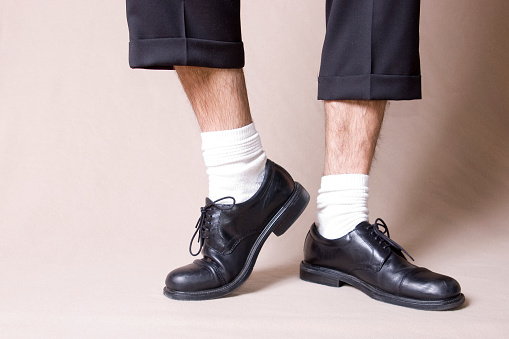 dress shoes with white socks and short pants