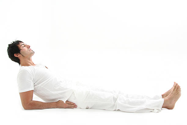 Yoga Young man meditating noah young stock pictures, royalty-free photos & images