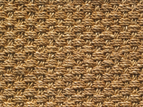Ruge in beige woven textile for use as a background.