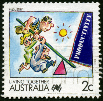 A two cent Australian postage stamp depicting men and women working together for greater productivity.