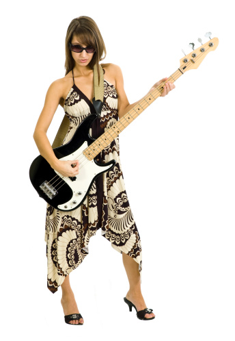 young woman playing bass guitar