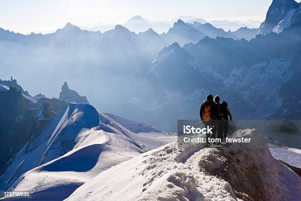 Climbers On Mountain Ridge Stock Photo - Download Image Now - Leading, Guide - Occupation, Mountain