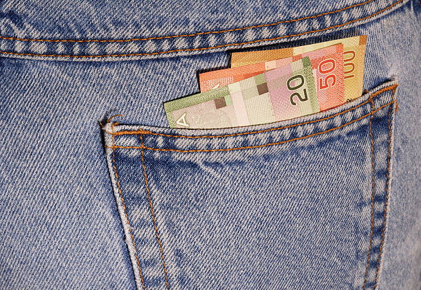 In a pocket dark blue jeans inserted bus ticket