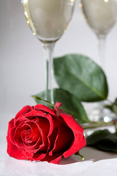 istock Red rose and two glasses of champagne 172720419