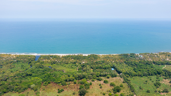 Aerial view captured by drone of Guachaca Beach, Santa Marta, Colombia