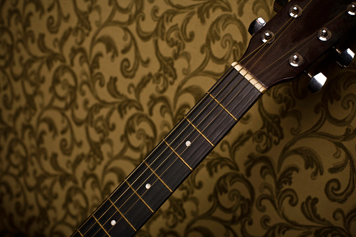 Not just a picture of half a guitar.  This can be a symbol reminiscent of hills,