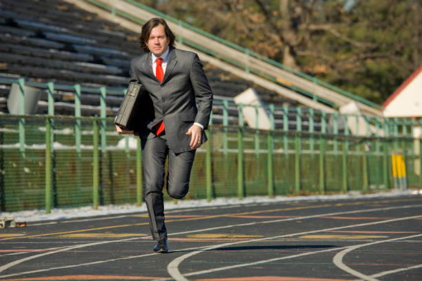 istock business man running on track 172723173
