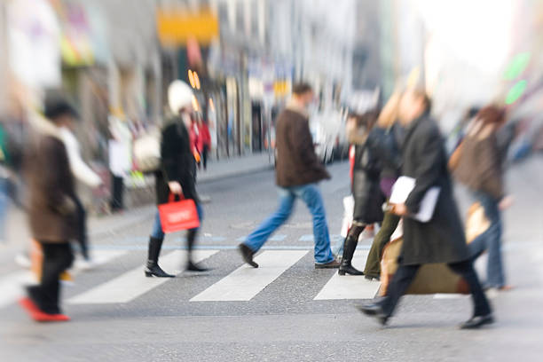 Walking People on a zebra crossing yt stock pictures, royalty-free photos & images