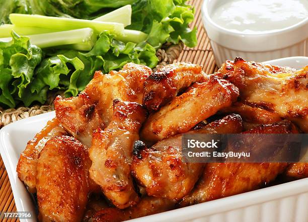 Serving Of Crispy Chicken Wings And Salad Stock Photo - Download Image Now - Chicken Wing, Buffalo Chicken Wings, Animal Wing