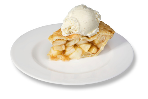 A slice of apple pie with a scoop of vanilla ice cream.  Isolated on white with clipping path.