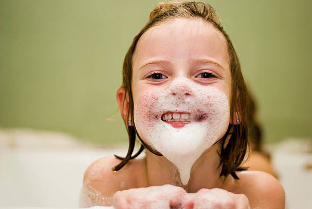 7 year old girl in bubble bath with white foam beard-More (More Bathroom Pictures)