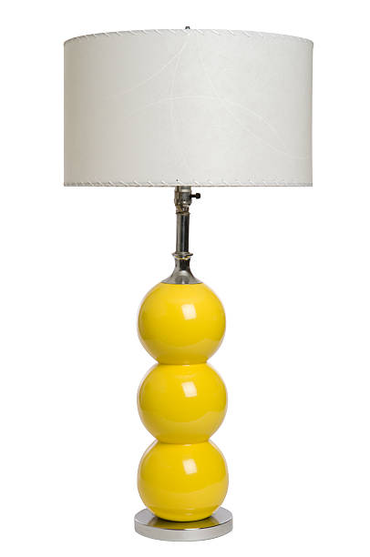 istock An image of a modern yellow lamp against a white background 172724629