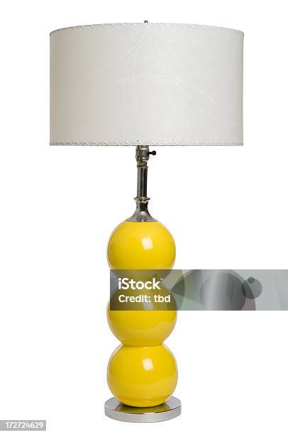 An Image Of A Modern Yellow Lamp Against A White Background Stock Photo - Download Image Now