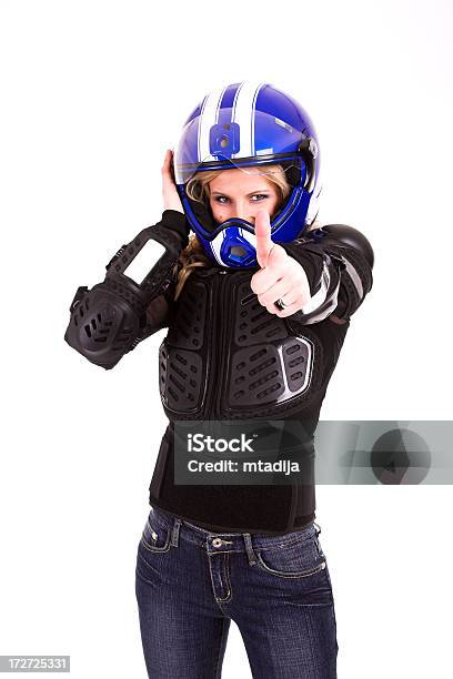 Joven Hermosa Mujer En Motoracer Uniforme Foto de stock y más banco de imágenes de Accesorio de cabeza - Accesorio de cabeza, Adulto, Adulto joven