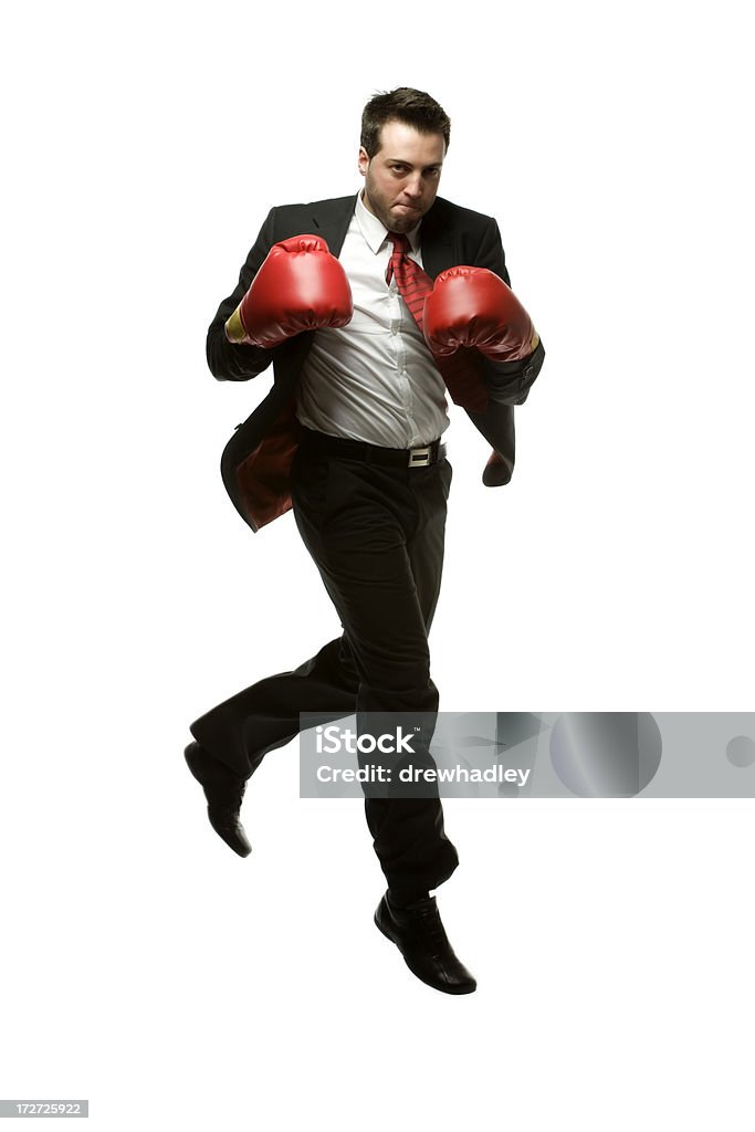 Biznesmen Skoki z czerwone rękawice bokserskie. - Zbiór zdjęć royalty-free (Białe tło)