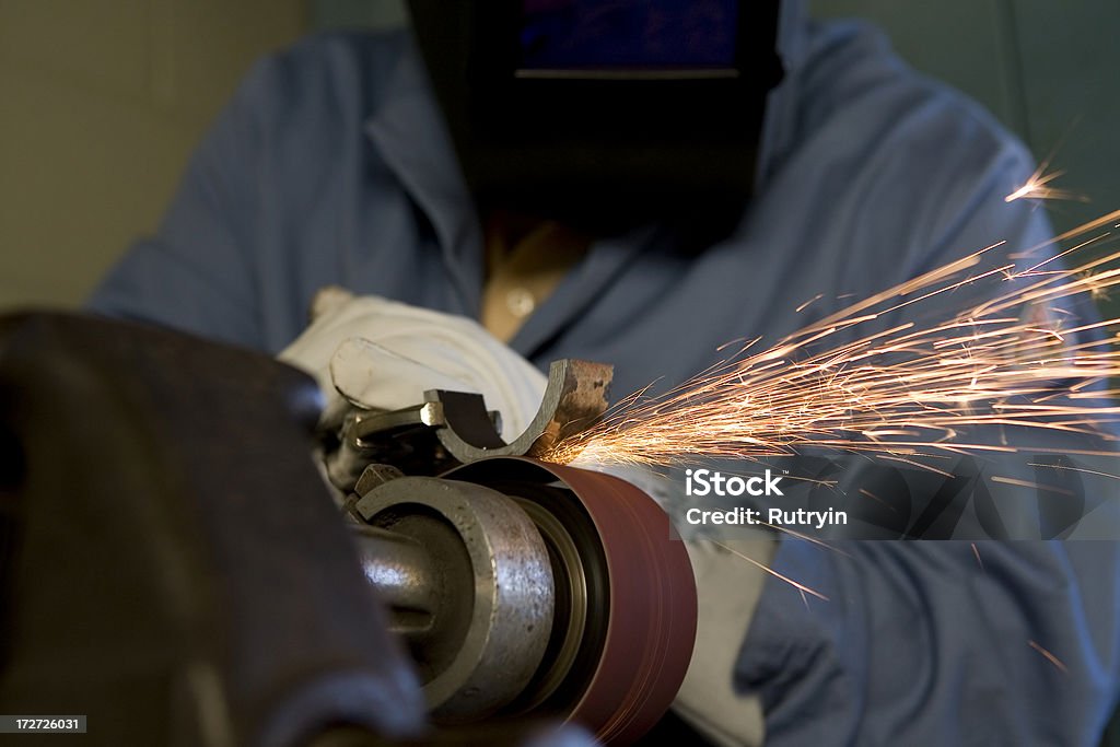 Sparks Sparks from metal grinding Sand Paper Stock Photo