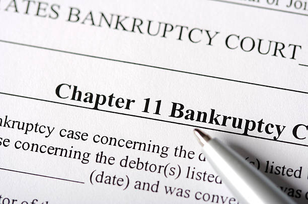 Chapter 11 Bankruptcy Paperwork United States legal documents focused on Chapter 11 Bankruptcy. broke stock pictures, royalty-free photos & images