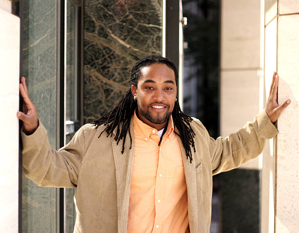 African-American male with dreads in casual attire African American male with dreads in casual attire corduroy jacket stock pictures, royalty-free photos & images