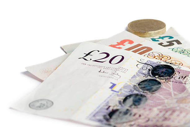 valuta britannica serie - consumerism twenty pound note finance investment foto e immagini stock