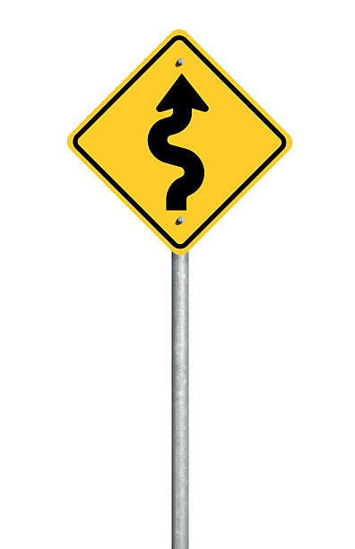 señal de carretera con curvas - road street sign slippery fotografías e imágenes de stock