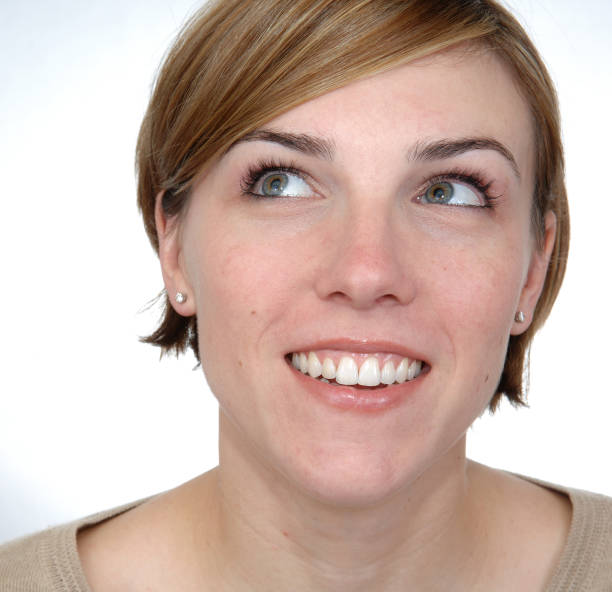 istock Happy woman looking up 172728778