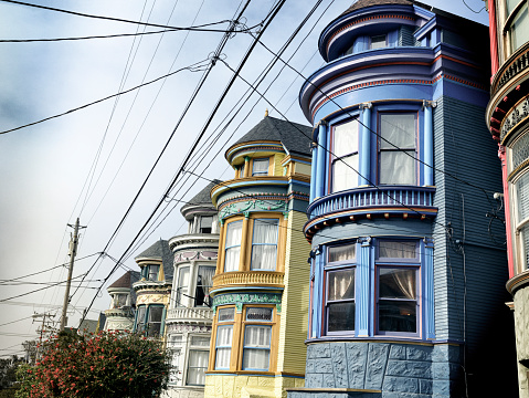Multicolored Victorian homes Haight Ashbury San Francisco California USA. Toned Image.
