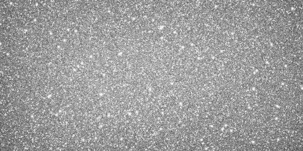 istock Silver glitter background texture white sparkling shiny wrapping paper for Christmas holiday seasonal wallpaper decoration, greeting and wedding invitation card design element 1727292083