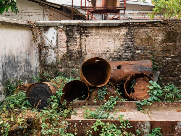 istock Seven broken and rusty drums in the yard 1727293722