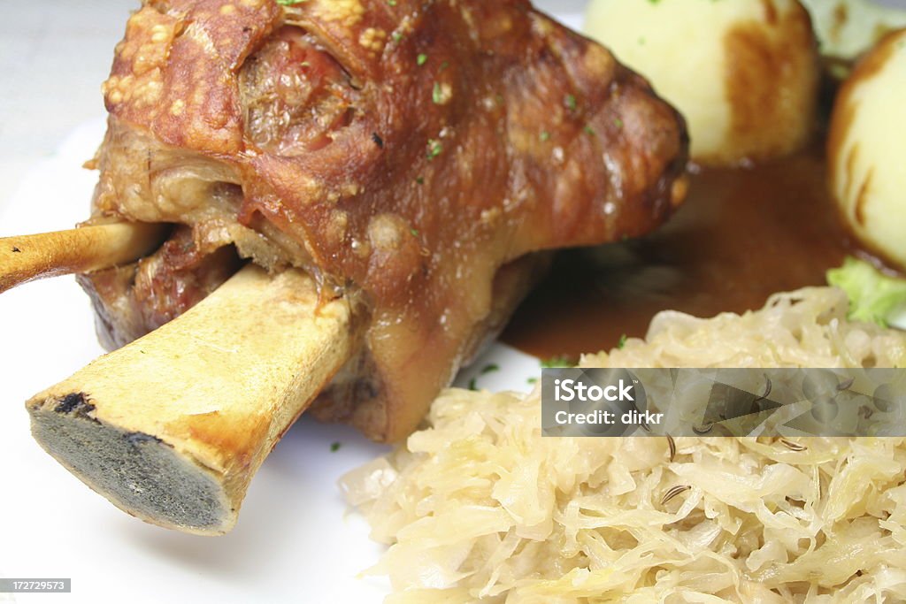 Shank of Pork "Shank (knuckle) of Pork with sauerkraut and dumplings, shallow dof" Dumpling Stock Photo