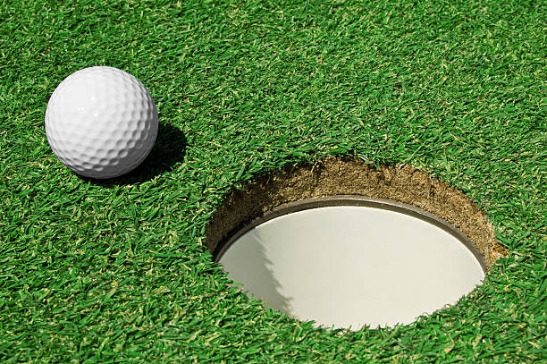 istock golf ball on the green 172729768